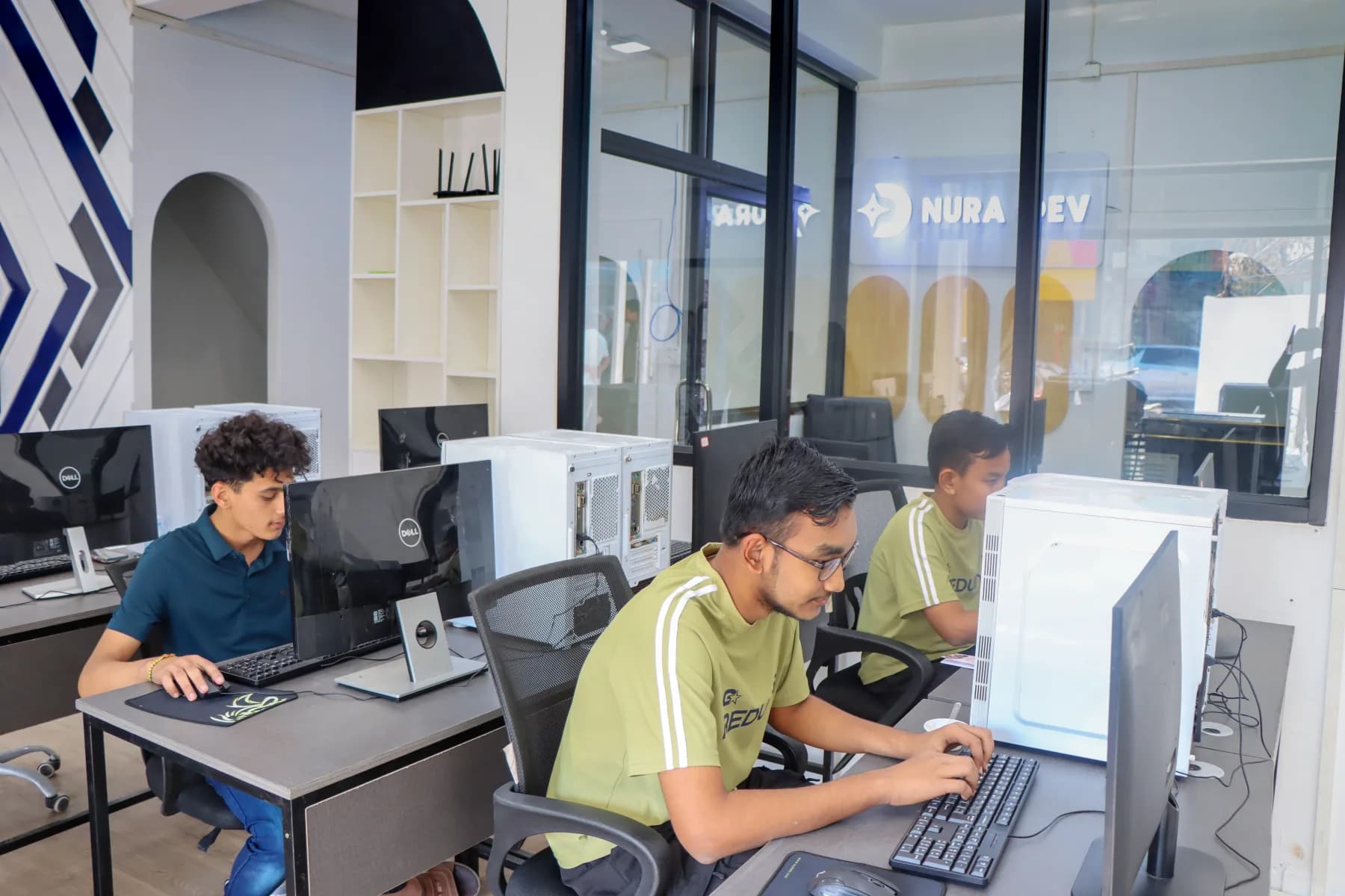 Nura Dev students learning together in a practical classroom session